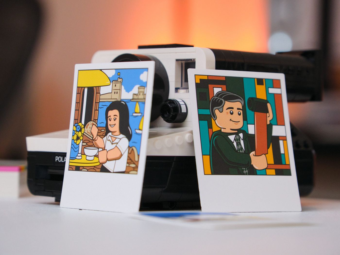 The final prototype photocards in real life, sitting against the Lego camera.
