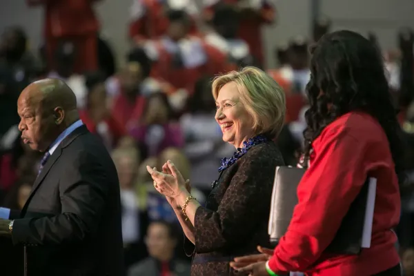 Democratic presidential candidate Hillary Clinton takes the stage with Rep. John Lewis (D-GA) (left) during an African Americans For Hillary rally at Clark Atlanta University on October 30, 2015, in Atlanta, Georgia.