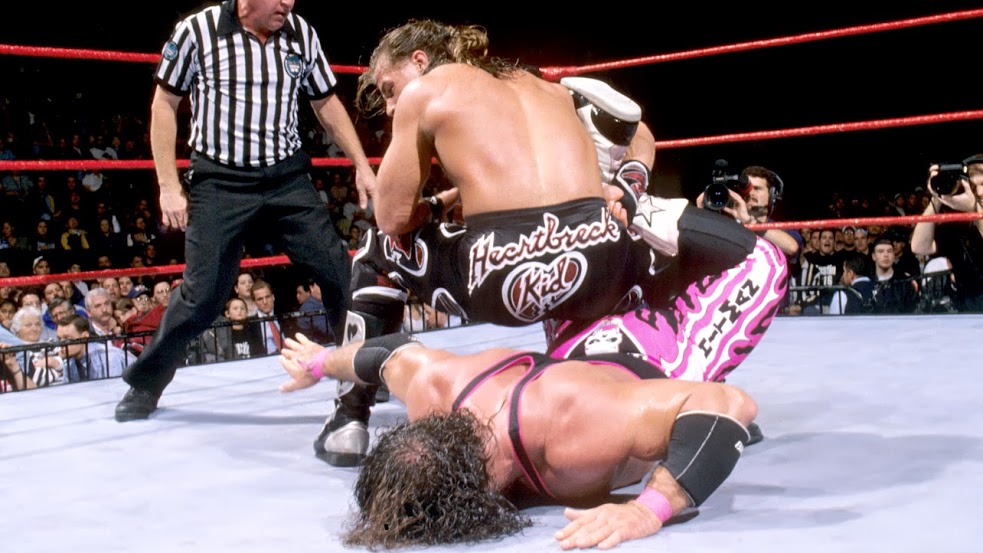 Bret Hart tapping to Shawn Michaels
